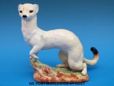 A Beswick white stoat impressed 1021 to base
