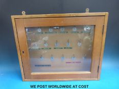 An oak key cabinet with glass door (width 52cm)