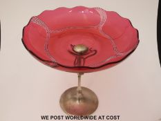 WMF cranberry glass tazza with cut decoration to the bowl raised on stylised silver plated base