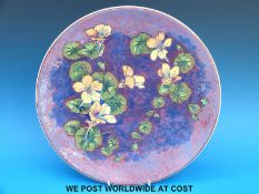 A Royal Doulton charger with nasturtium design (34cm diameter)