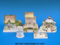 A small collection of Coalport cottages