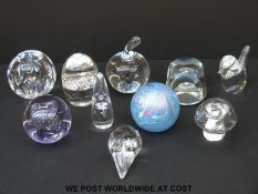 Ten glass paperweights including Isle of Wight,