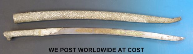 A 19thC Turkish Yatagan or short sword with slightly curved single edged blade damascene inlaid in