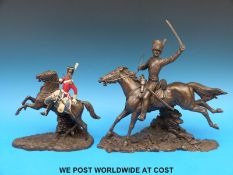 Two cold cast bronze 'Heredities' figures of cavalry men, one part painted 25cm tall,