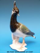 A Karl Ens ceramic lapwing (19cm tall)