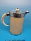 A circa early 20thC ivory jug/stein with plated mounts,