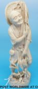 A Japanese ivory okimono of a fisherman (approx 21cm tall)