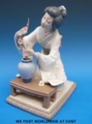 A Lladro figure of a Japanese flower arranger (21cm tall)