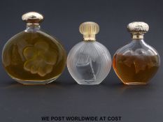 Three Lalique Nina Ricci scent bottles,