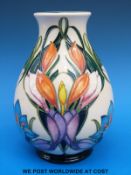 A Moorcroft vase decorated with crocuses,