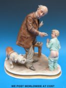 A Capodimonte figural group 'The Injection' signed Falchi