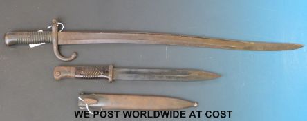 A German K98 bayonet marked 42 asw and a French style bayonet