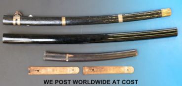 A collection of Japanese sword sheaths/spare parts