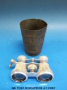 A pair of mother of pearl opera glasses and a German pewter beaker