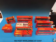 Twenty four Hornby and Tri-ang 00 gauge carriages and wagons,