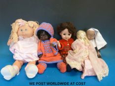 Five various dolls to include walking doll, Cabbage Patch doll,