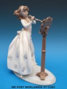 A Lladro figurine of a clarinetist (23cm tall)
