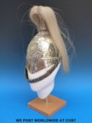 A Victorian Yorkshire Dragoons Guards helmet in silvered finish with plume