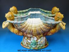 A pair of continental Majolica figural pedestal jardinieres (maximum height 31cm,