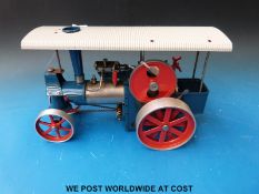 An early Wilesco live steam D40 traction engine 'Old Smokey' with the steam roller front, smoke box,