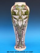 A Moorcroft limited edition (271/500) vase decorated with Arum lilies in the Remember design (38cm