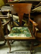 A mahogany elbow chair