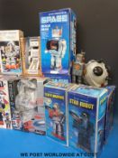 A quantity of robots, many in original boxes to include battery operated star robot, confused.