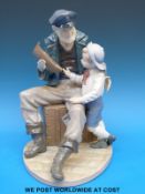 A Lladro figural group of a bearded sailor with model boat and child (28cm tall)