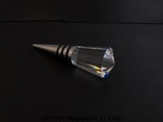 Swarovski bottle stopper with stainless steel stem and multi faceted crystal top decorated with a