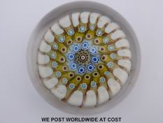 Richardsons Old English glass paperweight with four rings of multi coloured canes around a central