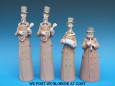 Four Lladro bells in the form of musicians (tallest 23cm)