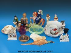 A collection of ceramics including a Beswick pheasant wall plaque, Royal Worcester 'Young Farmer',