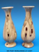 A pair of bud vases in mustard ground glaze by John Shelley of Bath (16cm tall)