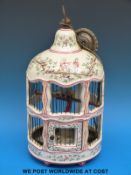 A ceramic hanging light in the form of a bird cage with chinoiserie decoration,