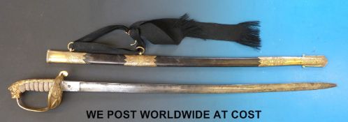 An 1827 pattern Naval Officer's sword with shagreen handle and brass mounted leather scabbard