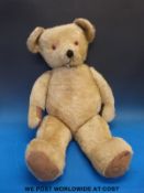A jointed blonde mohair straw filled English Teddy bear, jointed,