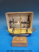 A 19thC painted brass sailing ship with soldiers,