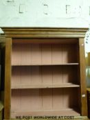 A Victorian pine dresser with shelves to top section,