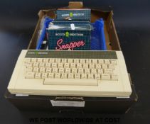 A vintage Acorn computer system and games