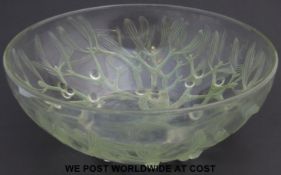 Lalique Gui glass bowl stained in green and decorated with mistletoe and raised on five bun feet