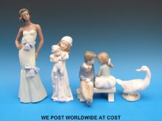 A group of four Lladro / Nao figures