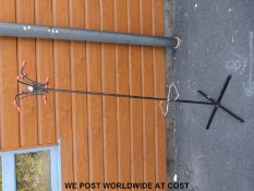 A retro coat rack with chrome and black finish