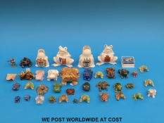 A collection of frog models including crested, lapis lazuli, agate,
