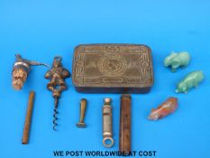 A WWI Christmas tin, gun oiler, white metal mounted cork stamped 835,