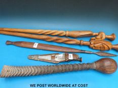 A collection of African tribal items to include a club fashioned from a Gemsbuck antler, a spear,