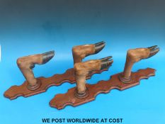 A taxidermy deer hoof or slot gun rack (63cm tall)