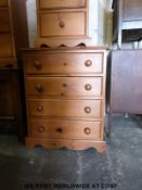 A small pine chest of four drawers (W65 x D43 x H79cm)