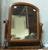 A mahogany swing frame dressing table mirror with drawers below