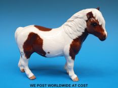 A Beswick 1995 Collector's Club skewbald pony (14cm tall)