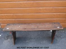 An antique elm bench with plank legs (L121 x W29 x H46cm)